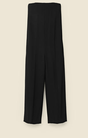 Strapless jumpsuit in crepe and leather